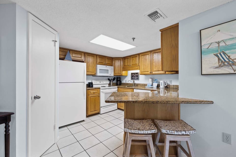Kitchen with eat-in bar seating