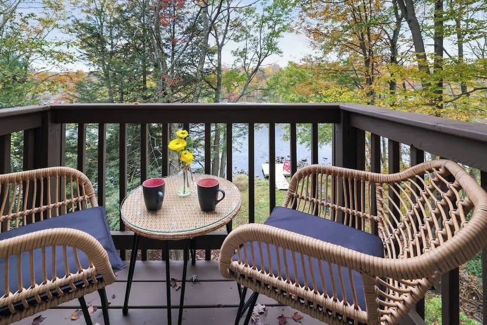 Brew-tiful Moments Await! Relax at the upstairs porch table with your favorite coffee, soaking in the tranquil lake view!