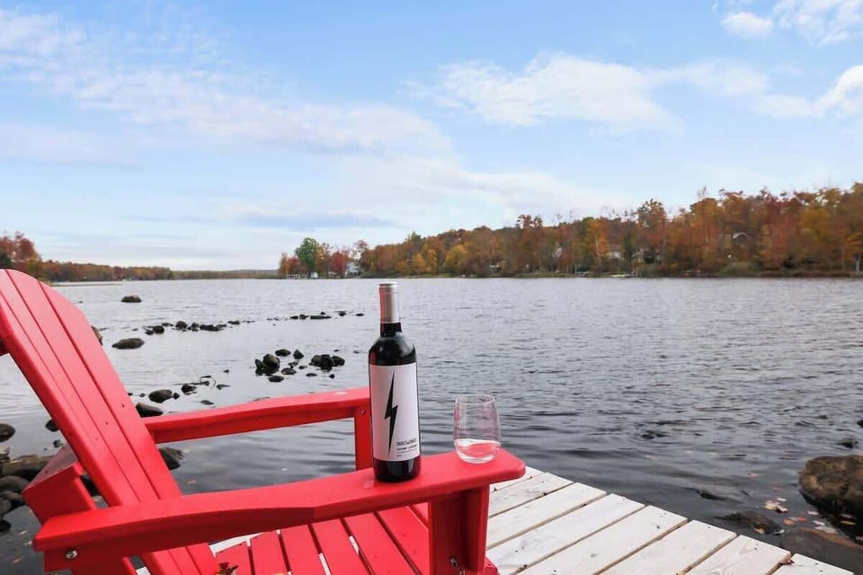 Enjoy a quiet moment with wine and a peaceful lake view.