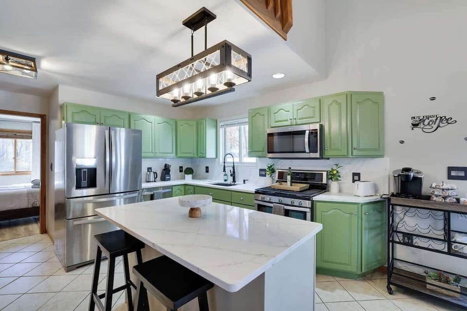 Bright and spacious kitchen equipped with modern appliances – perfect for whipping up your favorite meals