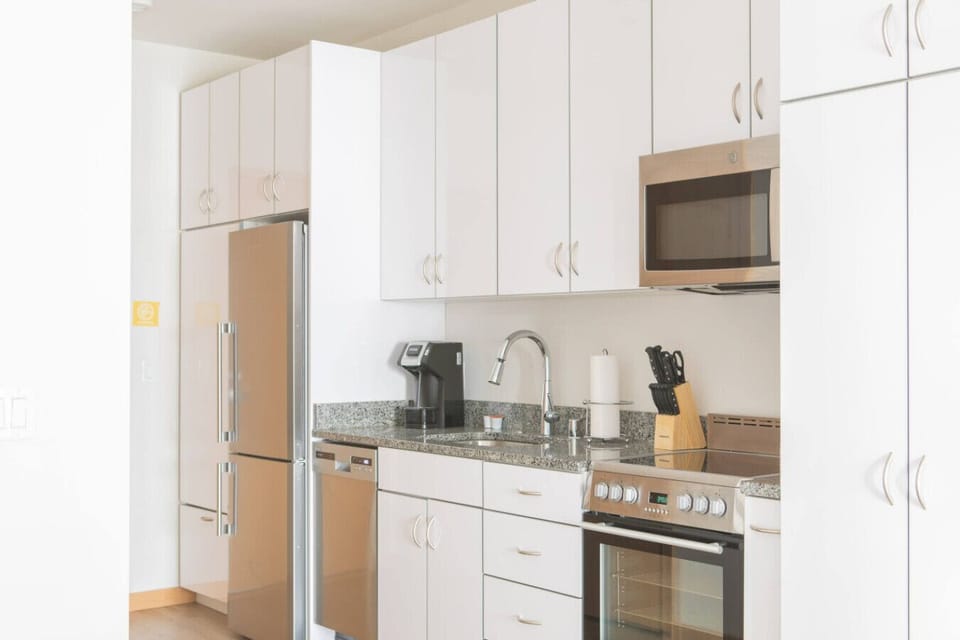 Whip up your favorite meals in the sleek, fully equipped modern kitchen