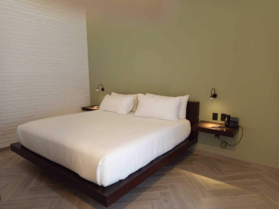 Superior Room, 1 King Bed | In-room safe, individually decorated, individually furnished, desk