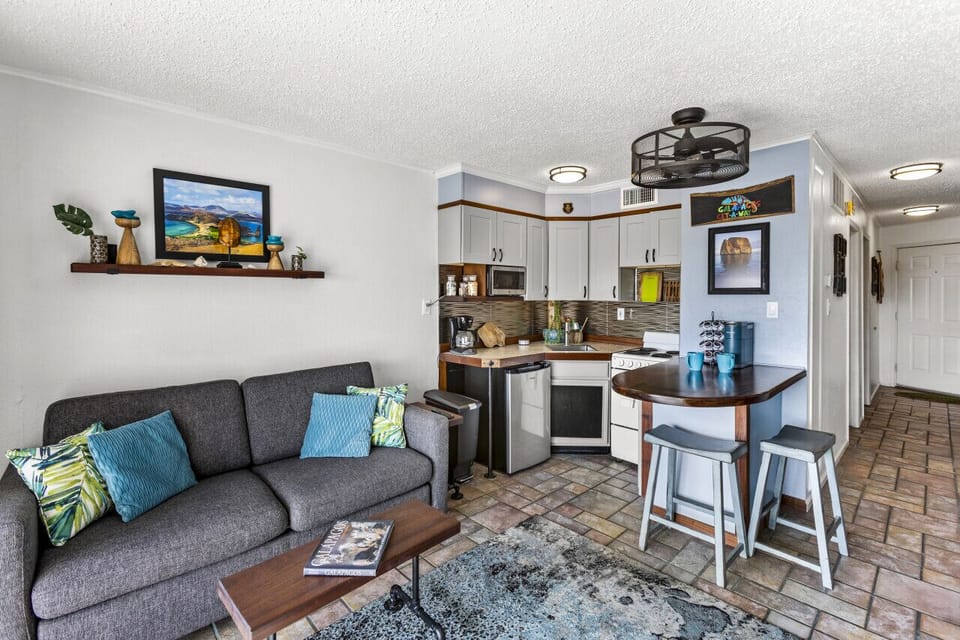 Spacious living room with plenty of natural light and comfort.