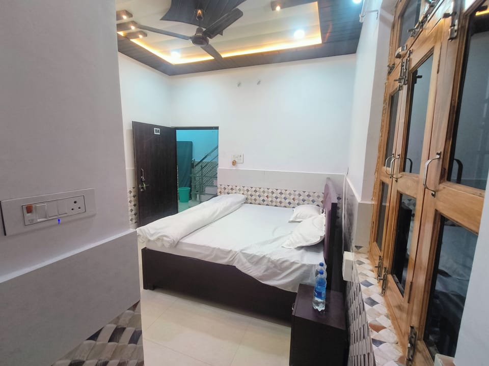 Deluxe Double Room, City View | In-room safe, desk, laptop workspace, blackout drapes