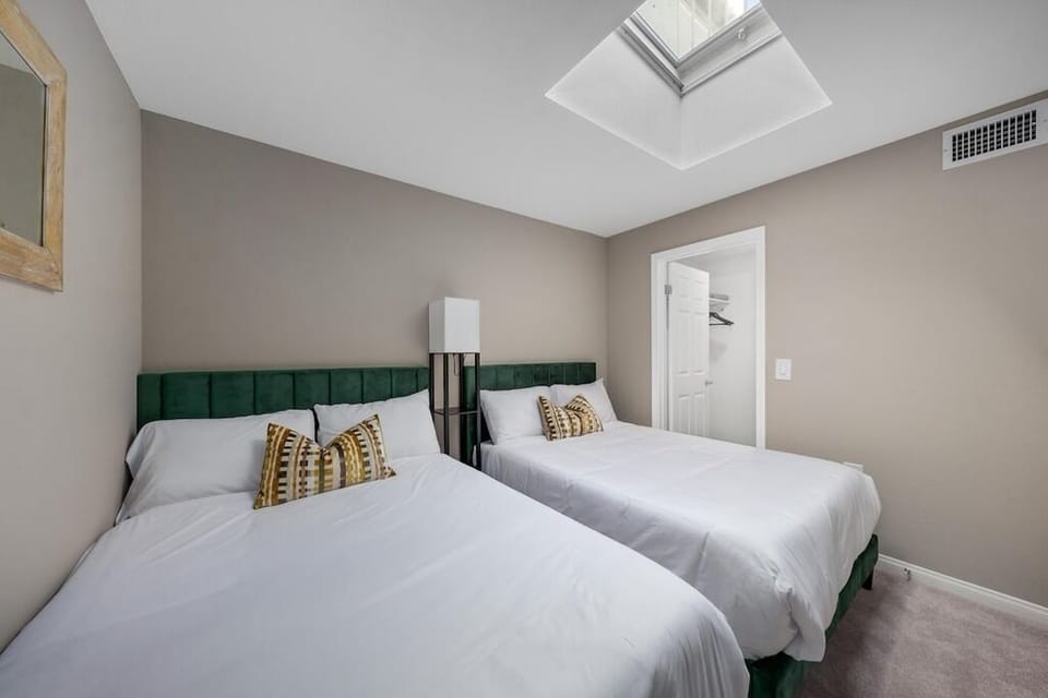 Unique skylight fills the room with beautiful, soft natural light all day.