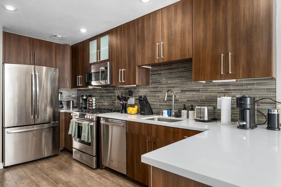 Professional-grade stainless steel appliances, including a spacious refrigerator