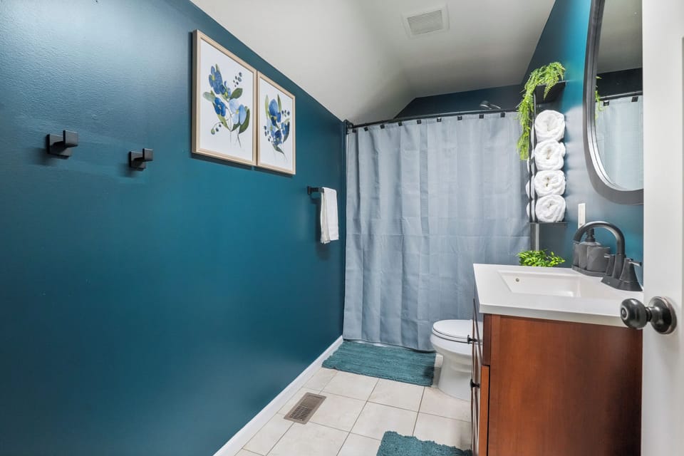 Cozy bathroom with thoughtful decor and modern amenities for your comfort.