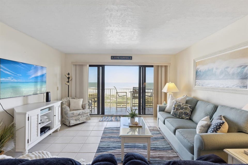 Oceanfront living room with a spacious layout and natural light, perfect for unwinding.