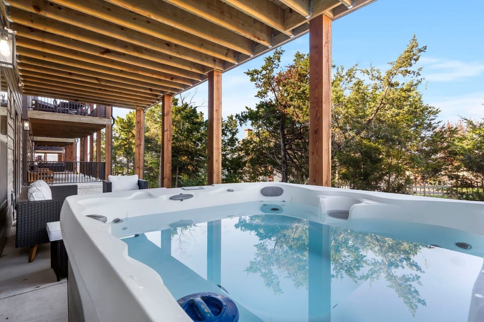 Downstairs Patio with Seating and a Hot Tub!