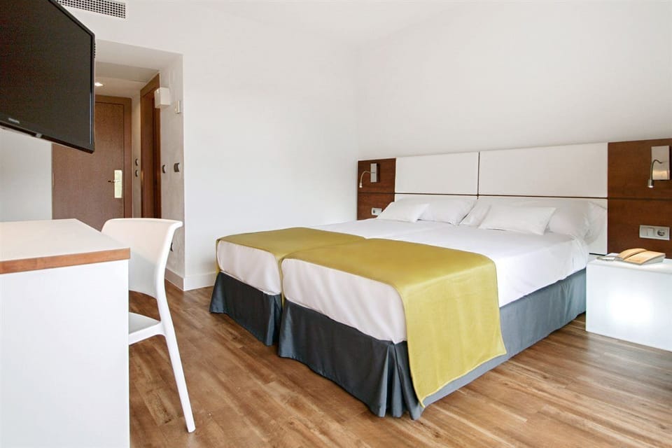 Desk, blackout drapes, WiFi (free), bed sheets