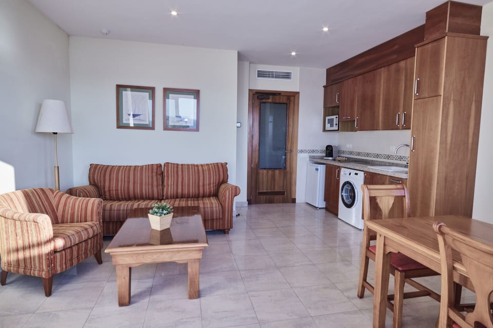 Family Apartment, Sea View (Superior) | Private kitchen | Coffee/tea maker, highchair