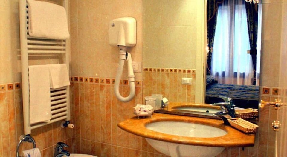 Free toiletries, hair dryer, slippers, bidet