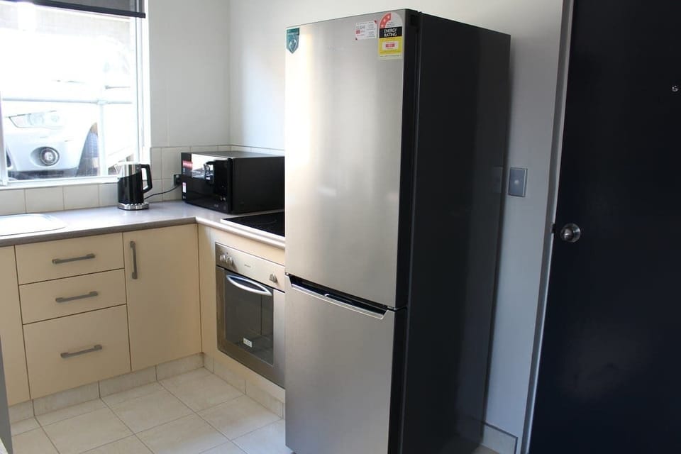 Kitchen with full sized fridge/freezer