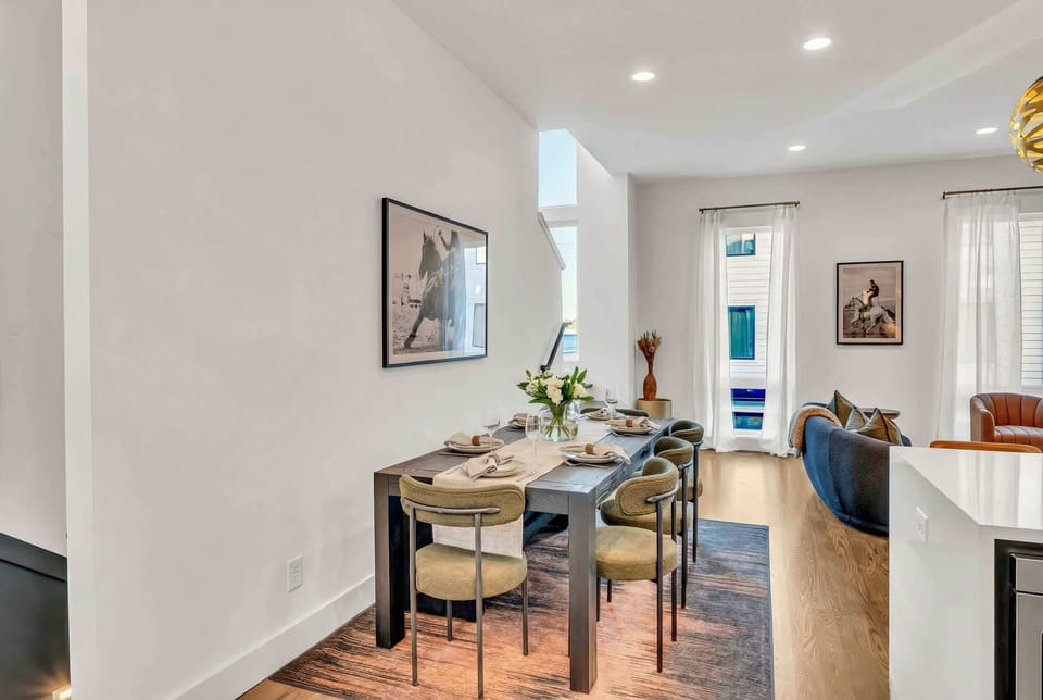 Dining happens at a real table with real place settings, not mismatched chairs grabbed from corners, so family meals or celebratory dinners feel complete and intentional