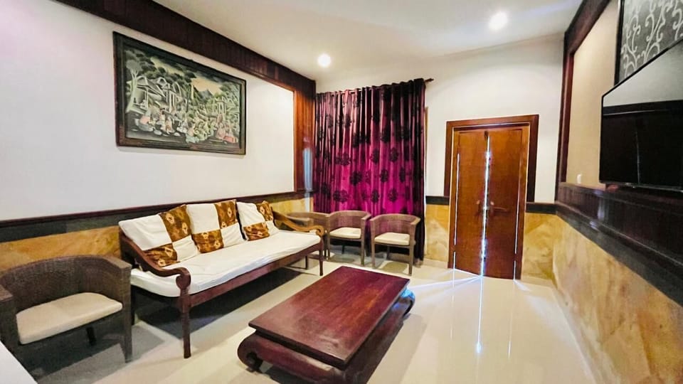 Double or Twin Room, Garden View | Living area | TV