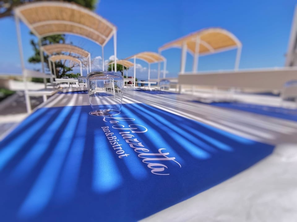 Breakfast, lunch, dinner served; beach views