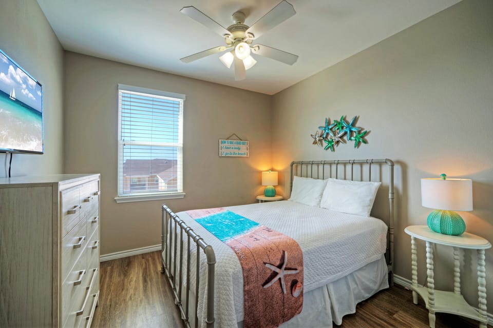 Bedroom 4 features a queen bed and a TV.