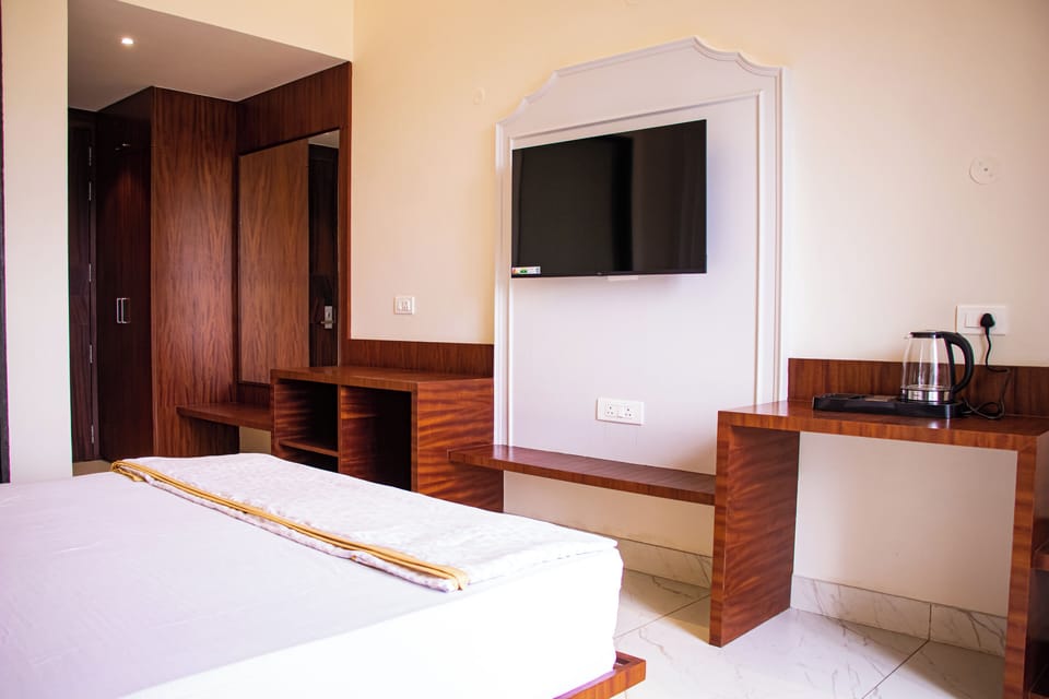 Deluxe Room, Garden View | Soundproofing, free WiFi