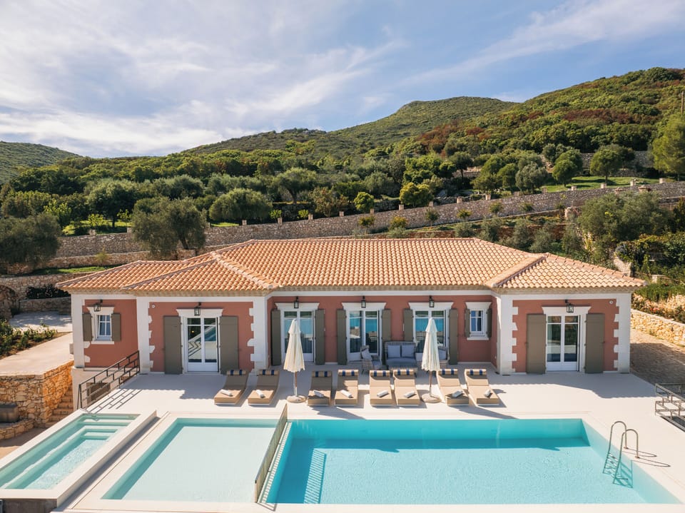 Refresh in a 60m² infinity pool overlooking the endless Ionian horizon.