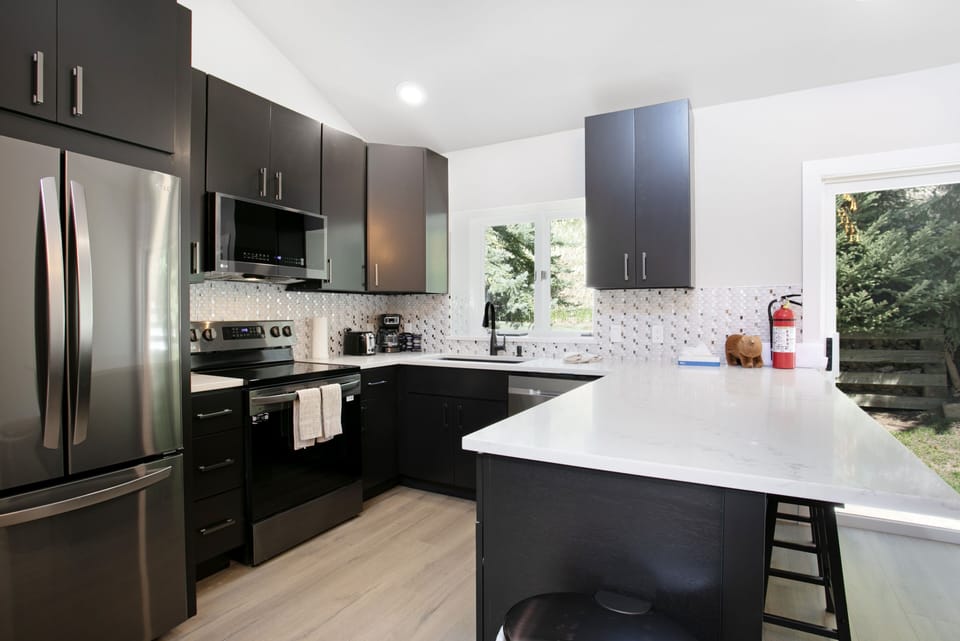 Townhome, 4 Bedrooms | Private kitchen | Coffee/tea maker, fridge, oven, toaster
