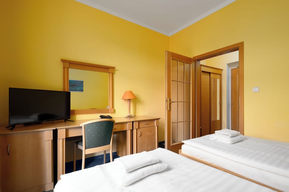 Superior Double Room, Balcony, City View | In-room safe, desk, laptop workspace, blackout drapes
