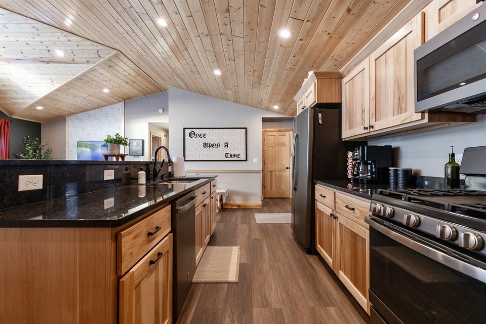 Kitchen equipped with coffee, tea, and coffee pods.  We have basic salt, pepper and olive oil as well.  All utensils, plates, bowls, glassware, crockpot and much more.