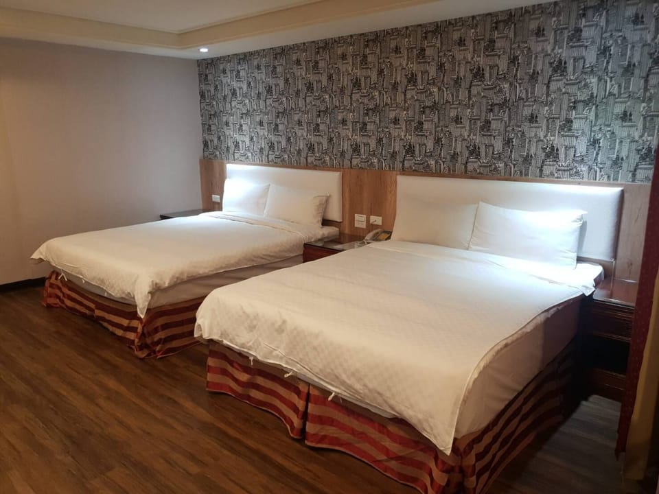Deluxe Quadruple Room | In-room safe, desk, blackout drapes, soundproofing