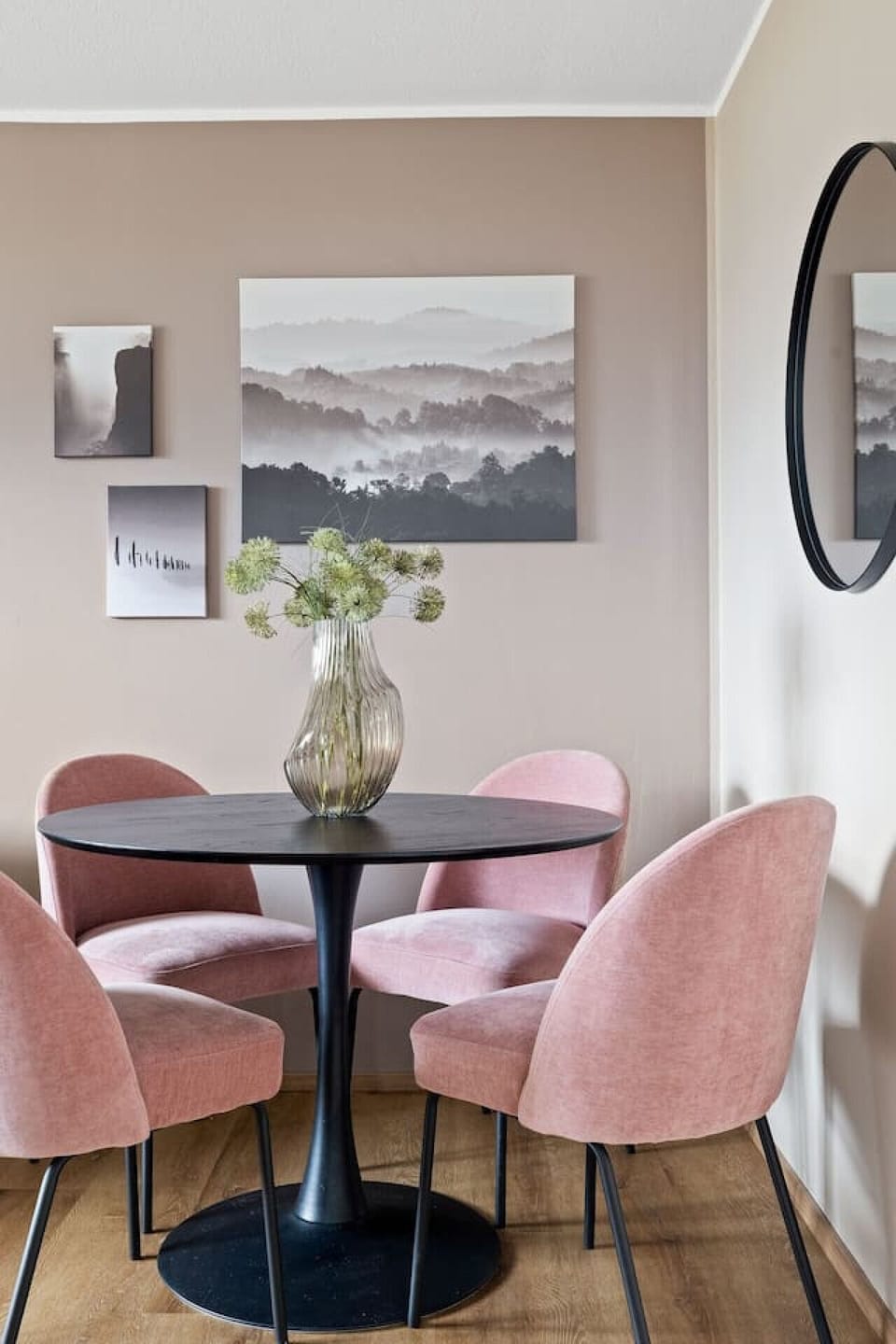 The dining area is a bright and inviting space, perfect for enjoying meals with family and friends.