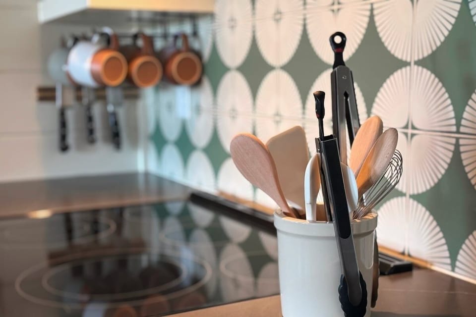 Kitchen is fully stocked with utensils and equipment to enjoy meals together