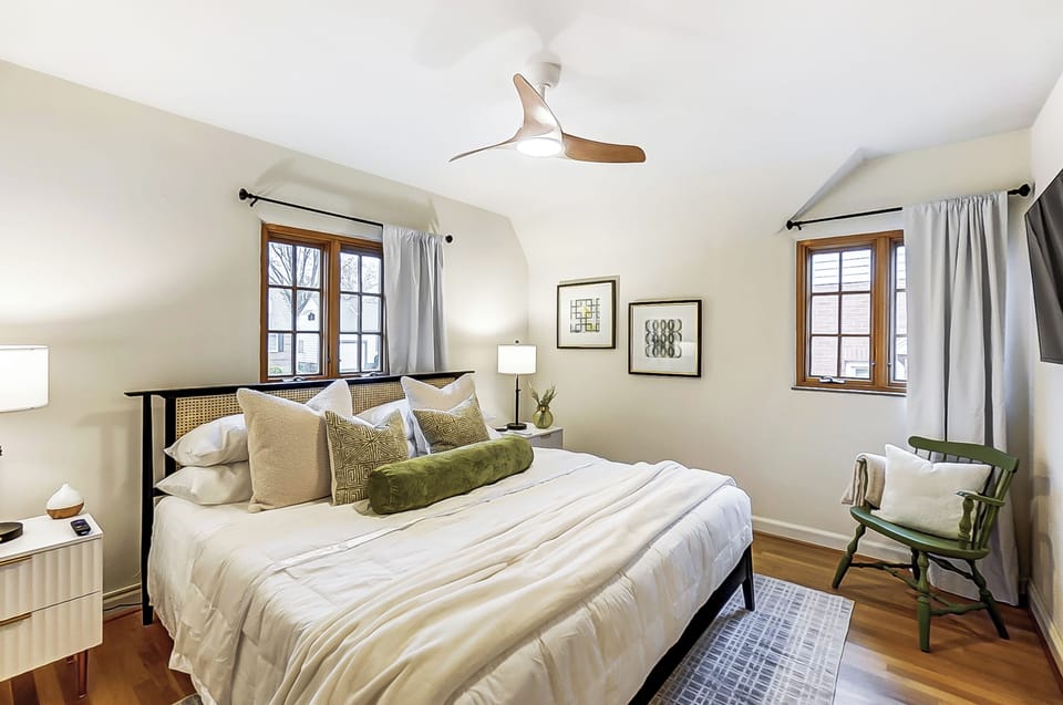Main level bedroom with King bed and extra cozy blankets.