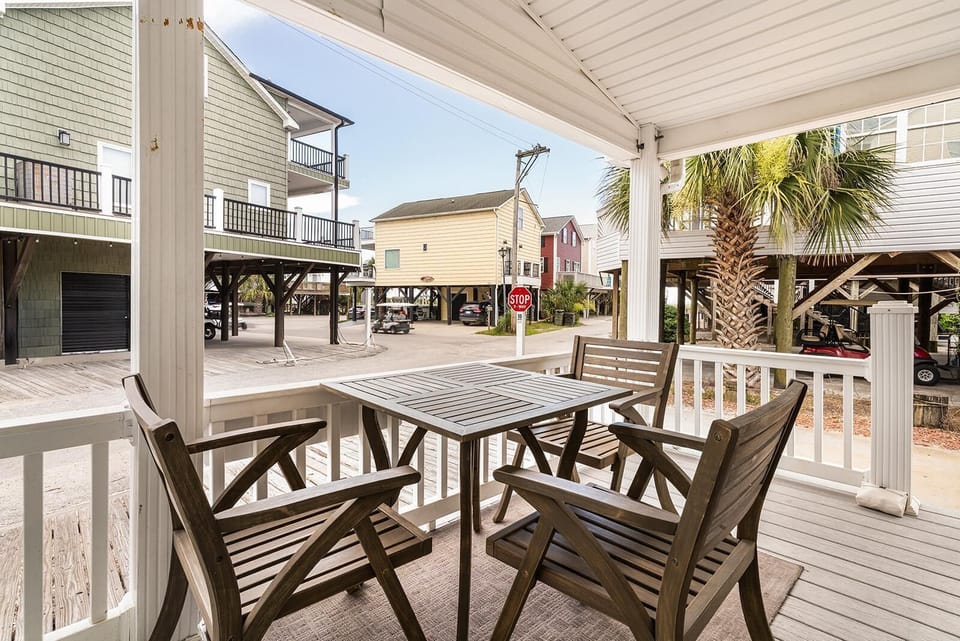 Shaded outdoor patio with cozy seating for relaxing gatherings