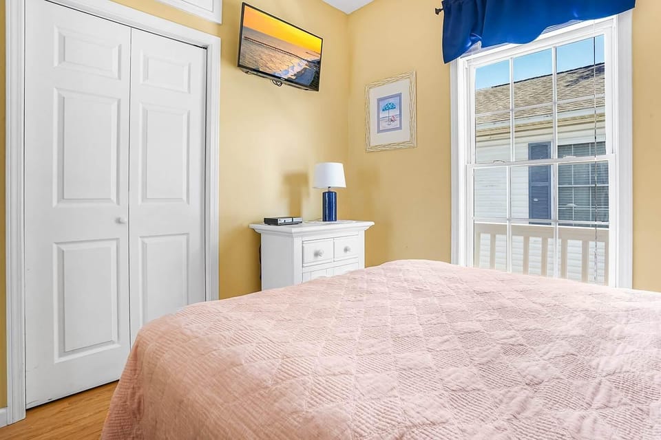 Cozy bedroom with bright natural light and charming decor