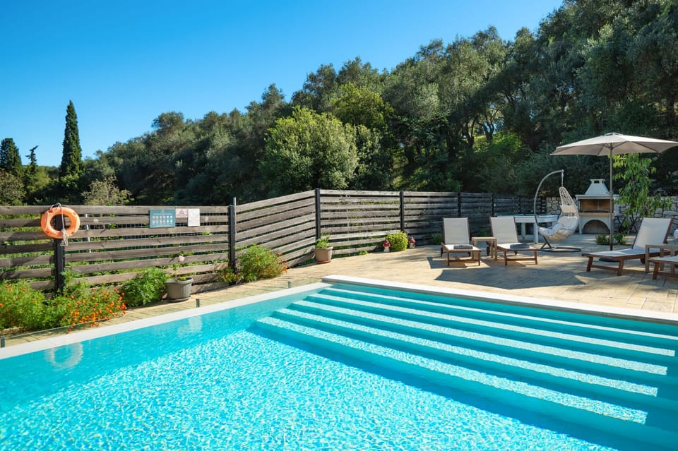 Pool with sunloungers