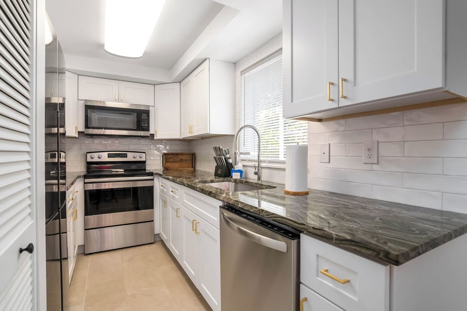 Bright Kitchen with plenty of counter space   