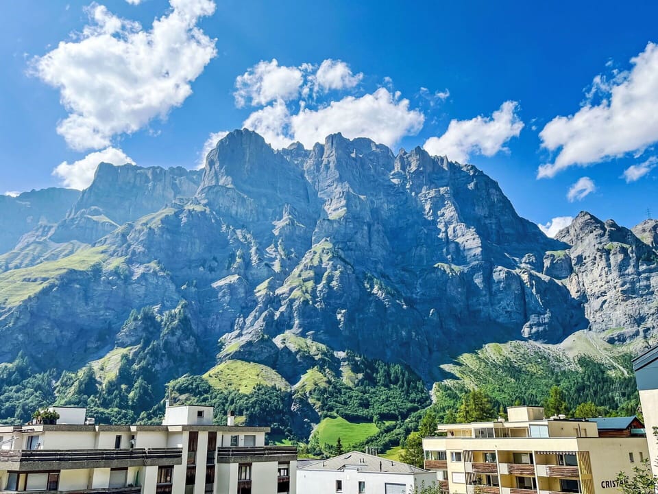 Cloud, Sky, Mountain, Building, Blue, Azure, Natural Landscape, World, Highland, Residential Area