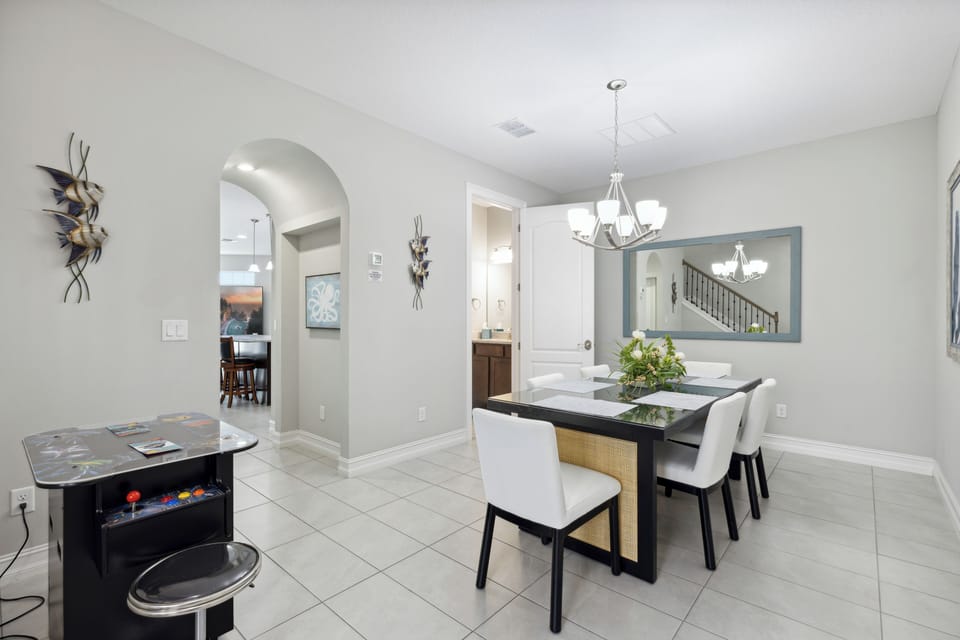 Dining Room with Modern Table and Chandelier Lighting