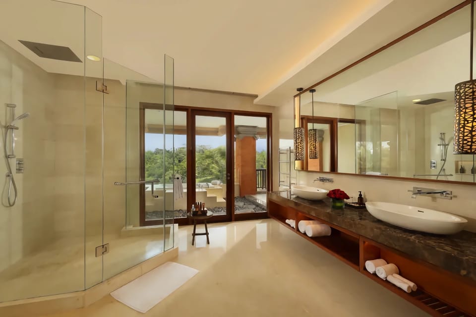 Suite, 1 Bedroom | Bathroom | Separate tub and shower, eco-friendly toiletries, hair dryer, bathrobes