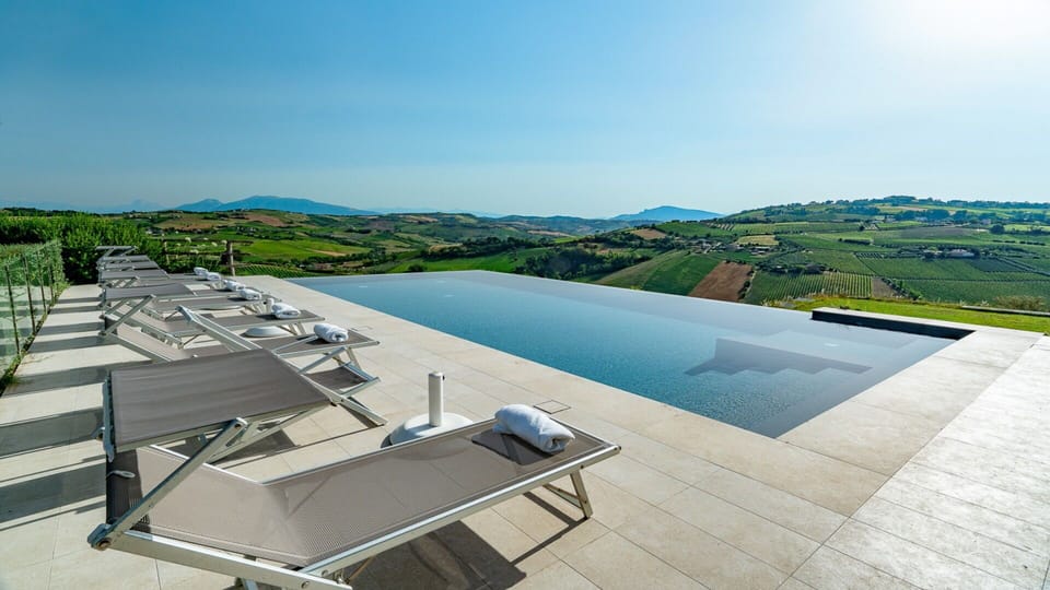 Sky, Building, Water, Outdoor Furniture, Urban Design, Condominium, Tree, Residential Area, Landscape, Swimming Pool