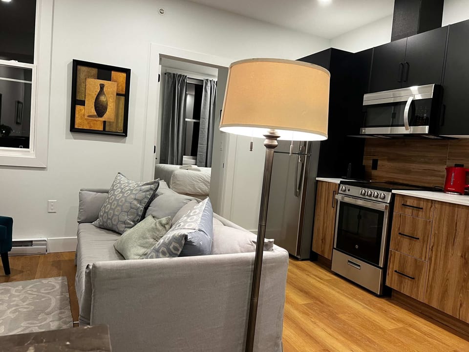 Modern comfort, featuring cozy seating and ambient lighting.