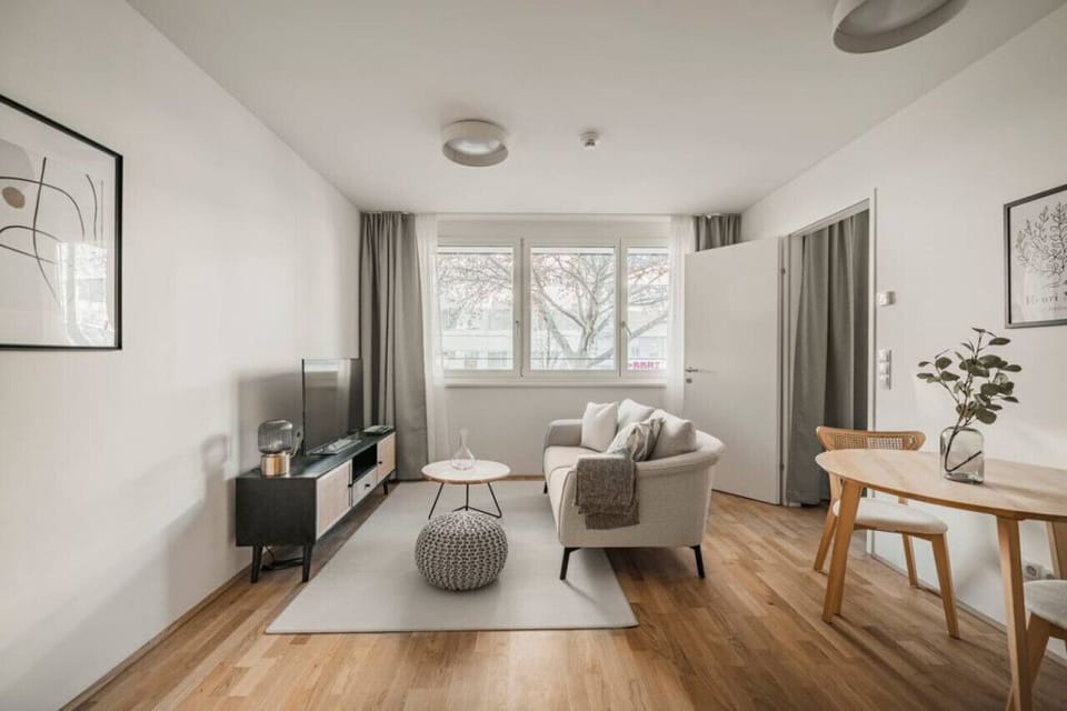 Welcome to the living room, the heart of your home, where Arbio Designers have curated a space for relaxation and togetherness.