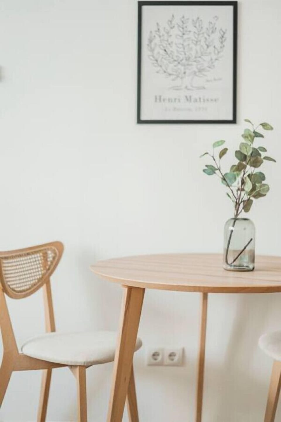 Step into the living room, where Arbio Designers` expertise shines through, creating a warm and inviting atmosphere, perfect for socializing or watching TV.