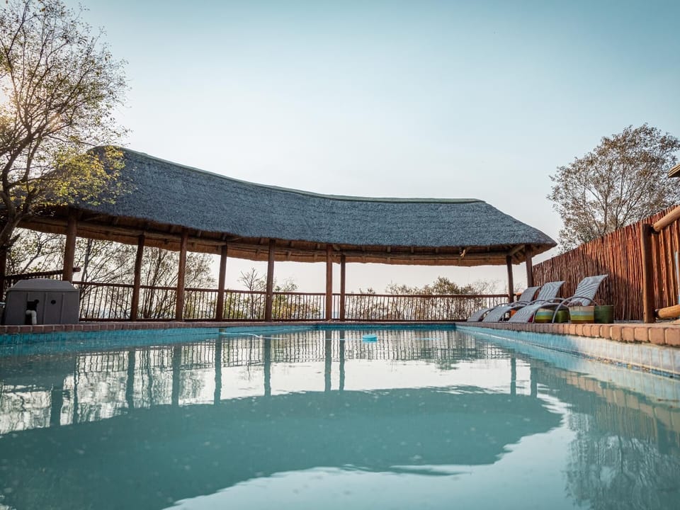 Room, 1 Bedroom, Patio, Garden View | Pool | Outdoor pool