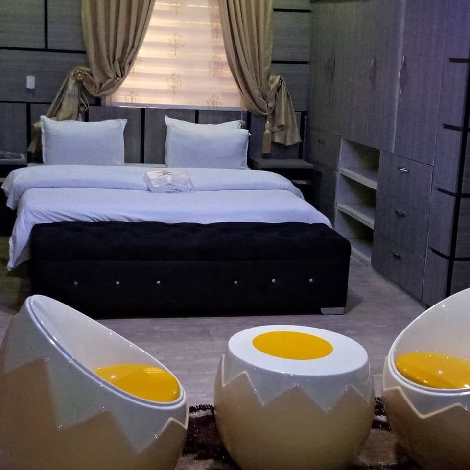 Family Room, Balcony, City View | Desk, laptop workspace, iron/ironing board, free WiFi