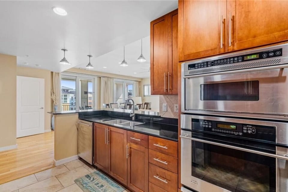 Spacious and complete, this full kitchen invites you to cook, gather, and make memories together.