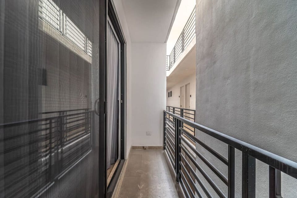 Enjoy breathtaking views of [mountains/ocean/cityscape] from this private balcony.