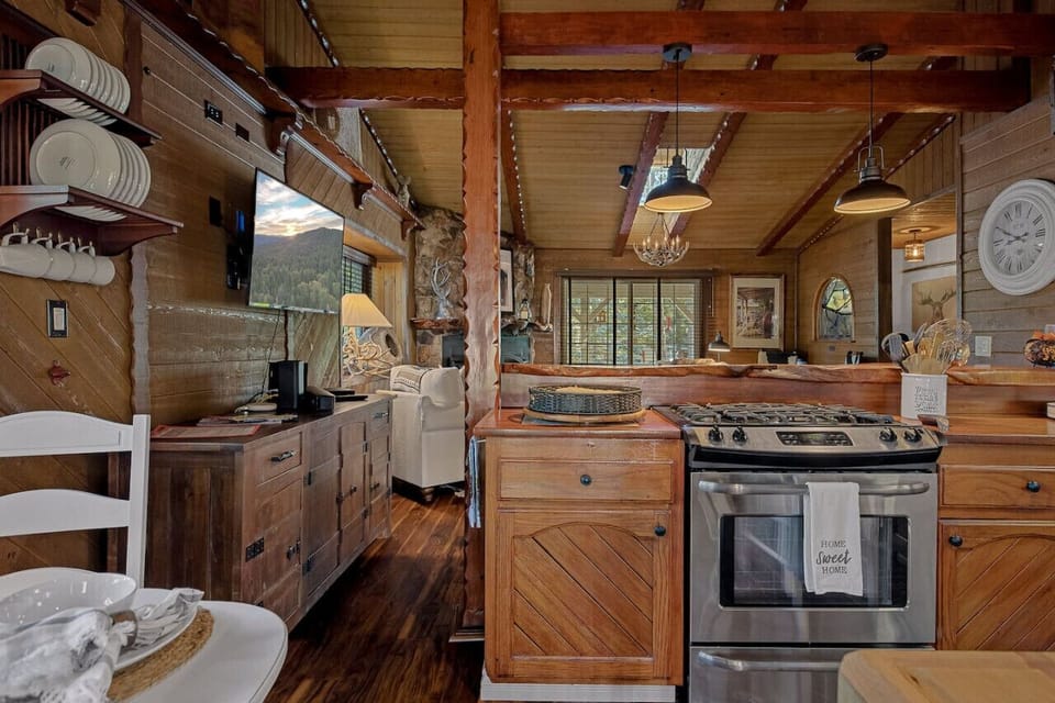 Country kitchen opens up in the living room space.