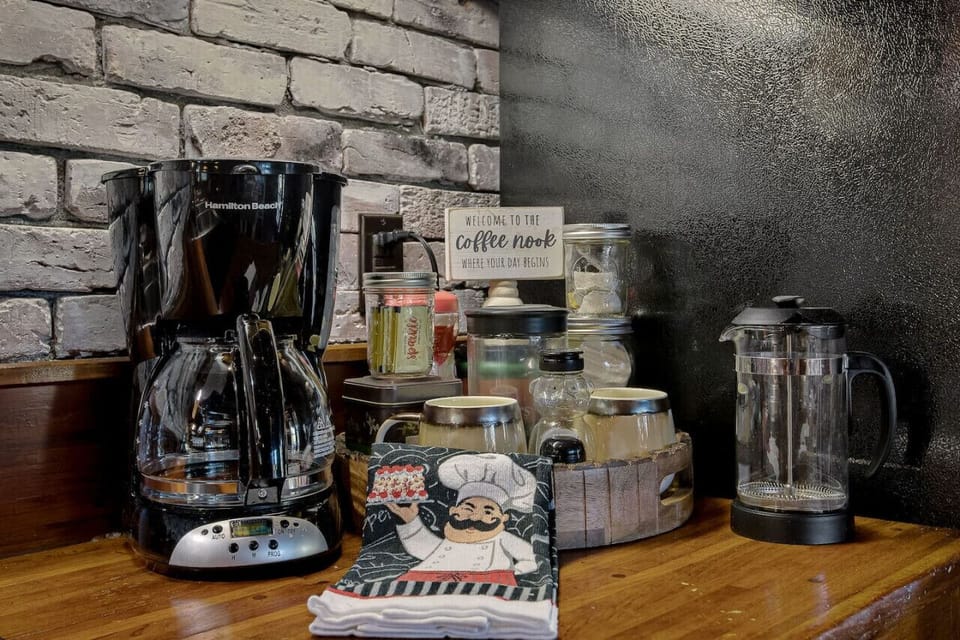 Experience our coffee nook, complete with tea, honey, sugar, a French press, a drip coffee maker along with coffee stocked.