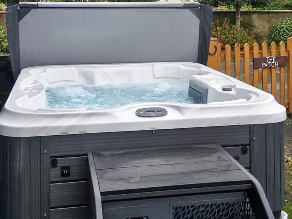 Hot tub | Oystercatcher Cottage, Llangwm, near Haverfordwest