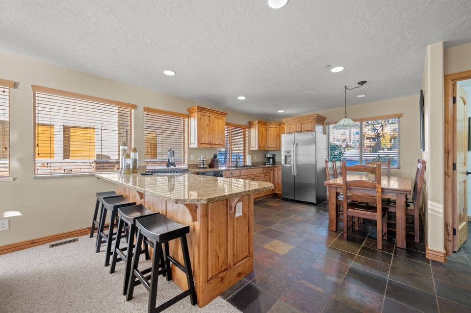 Cook your favorite meals in a kitchen bathed in natural light that enhance the culinary experience.