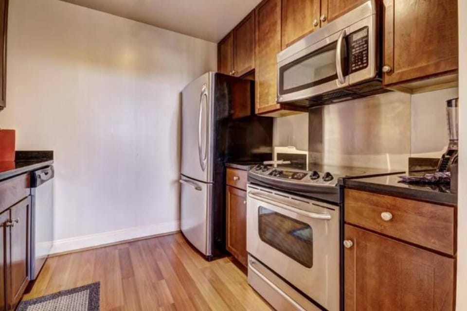 Apartment | Private kitchen | Full-size fridge, microwave, oven, stovetop